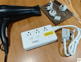 Image may contain Adapter Electronics Appliance Blow Dryer Device Electrical Device and Washer