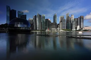 Singapore’s skyline. A former police officer was jailed for posing as a woman to molest teens in the city state. Photo: NurPhoto via Getty Images
