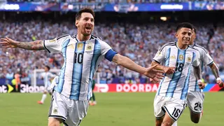 Lionel Messi celebrates scoring the first goal during Argentina's 3-0 win over Algeria