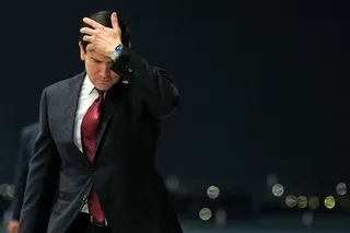 US Secretary of State Marco Rubio adjusts his hair following his arrival at al-Bateen Executive Airport in Abu Dhabi on June 23, 2026. — AFP pic